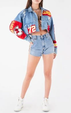 FURST OF A KIND VINTAGE NFL VINTAGE JERSEY PATCHWORK STUDDED CROPPED DENIM JACKET